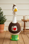 Hot Cocoa Cutie goose in a cozy winter porch setting
